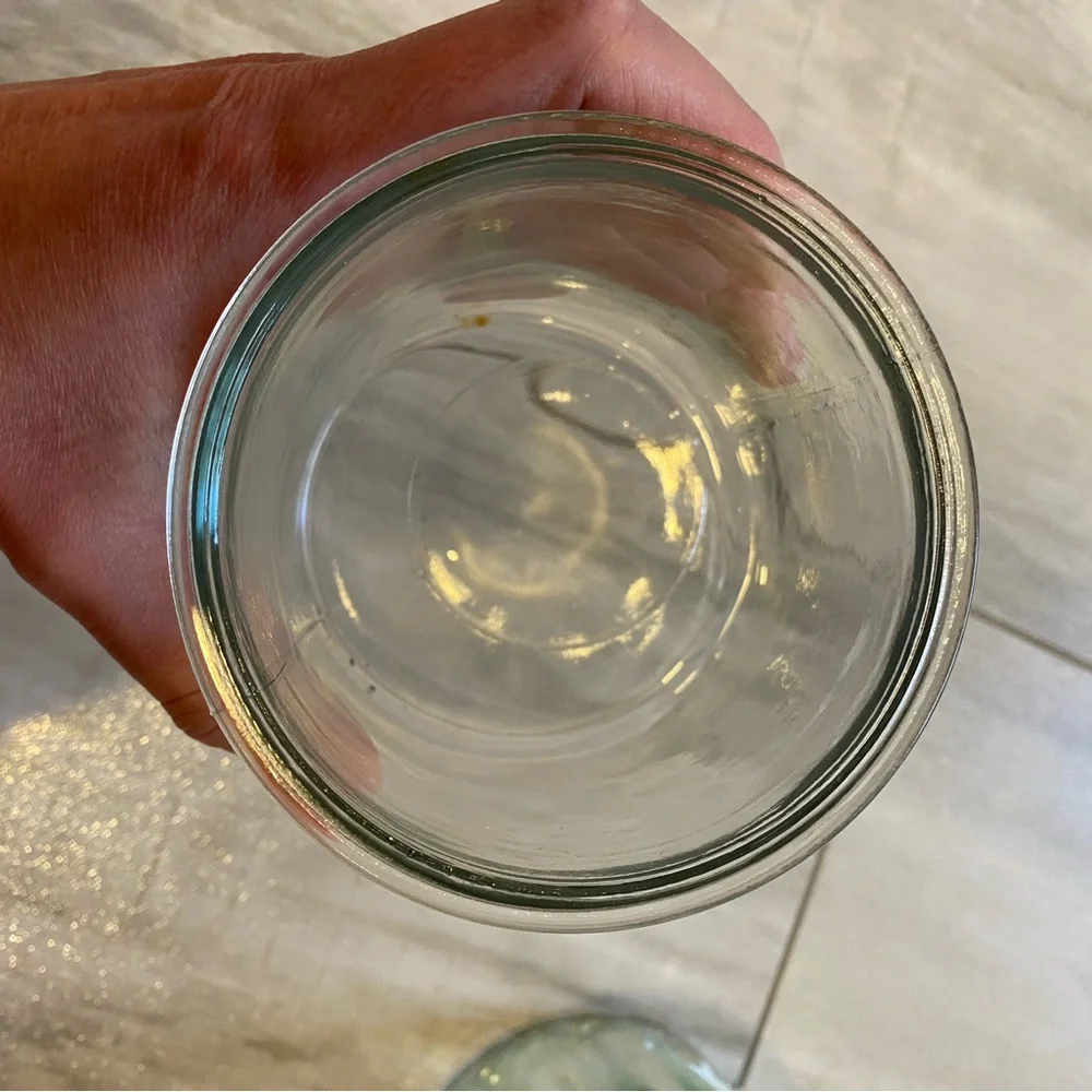 Bundle of Clear Round and Light Green Circular Textured Glass Vases